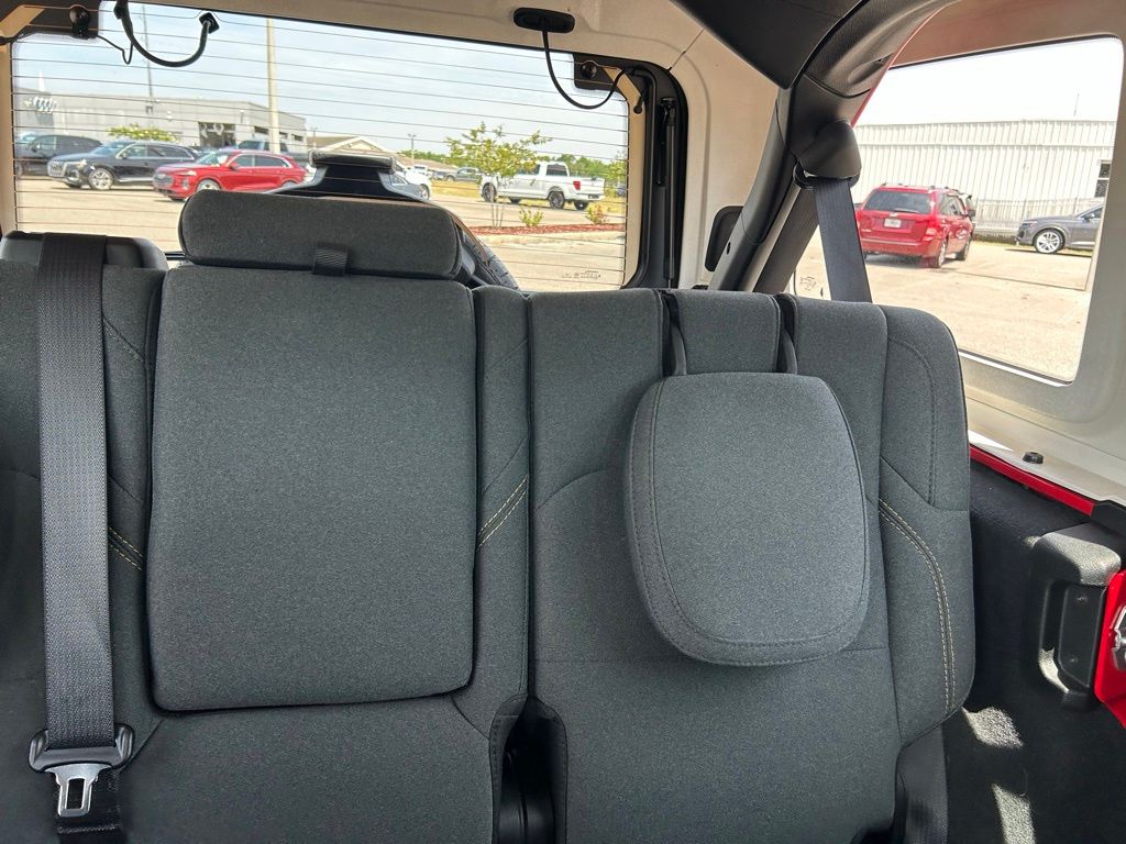 Used 2025 Firecracker Red Clearcoat Jeep Sahara 4xe image 13