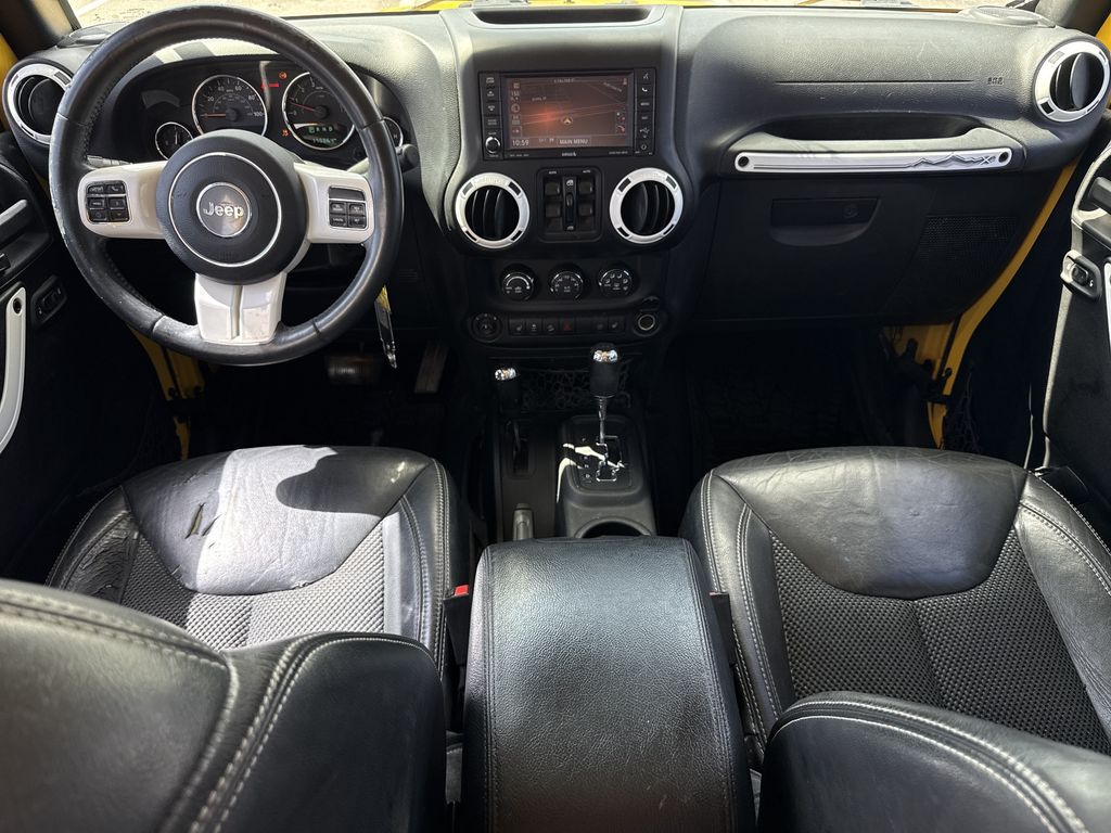 2015 Jeep Wrangler Unlimited Sahara Yellow at Parkway Family Mazda