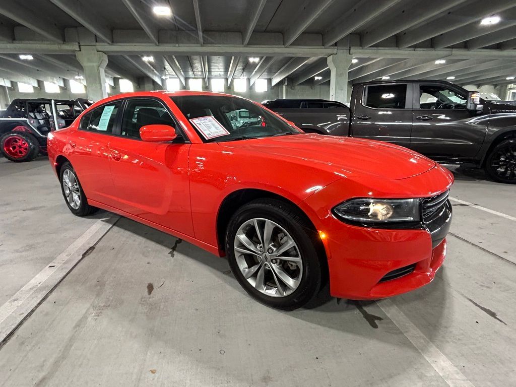 Certified 2022 Dodge Charger SXT with VIN 2C3CDXJG1NH134156 for sale in Miami, FL