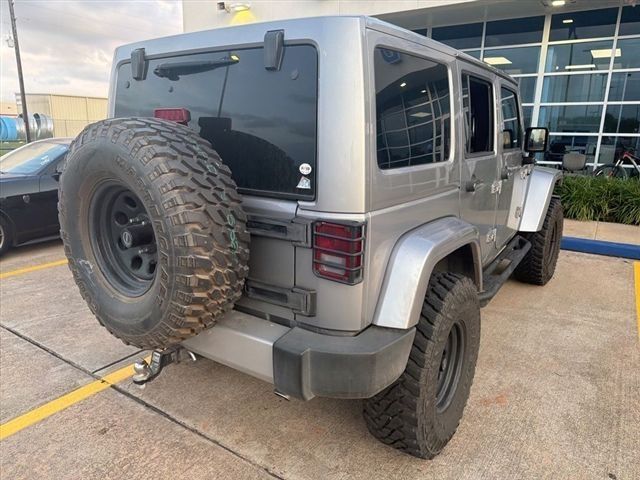 2013 Jeep Wrangler Unlimited Sahara Silver at Emmons Autoplex