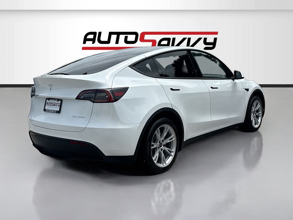 2024 Tesla Model Y Long Range White at AutoSavvy Houston Southwest