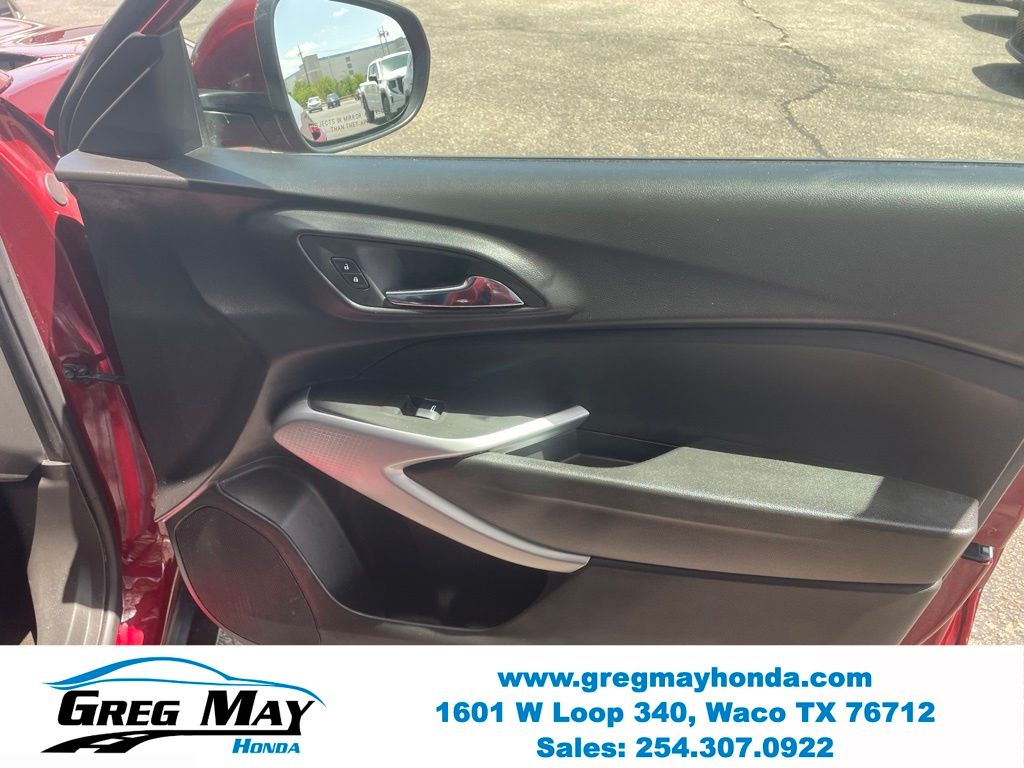 2025 Chevrolet Trax LS Red at Greg May Honda