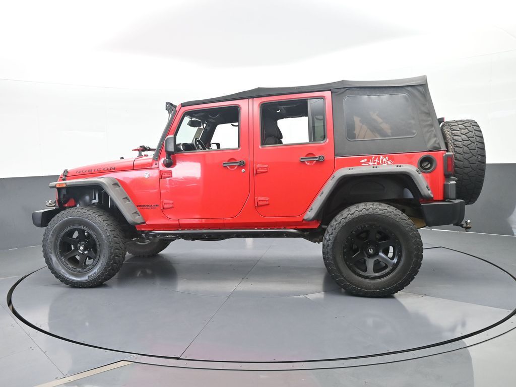 Used 2014 Firecracker Red Clear Coat Jeep Unlimited Rubicon image 3