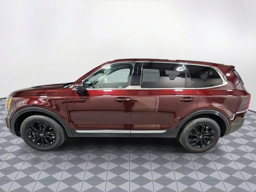 Used 2021 Purple Kia LX image 4