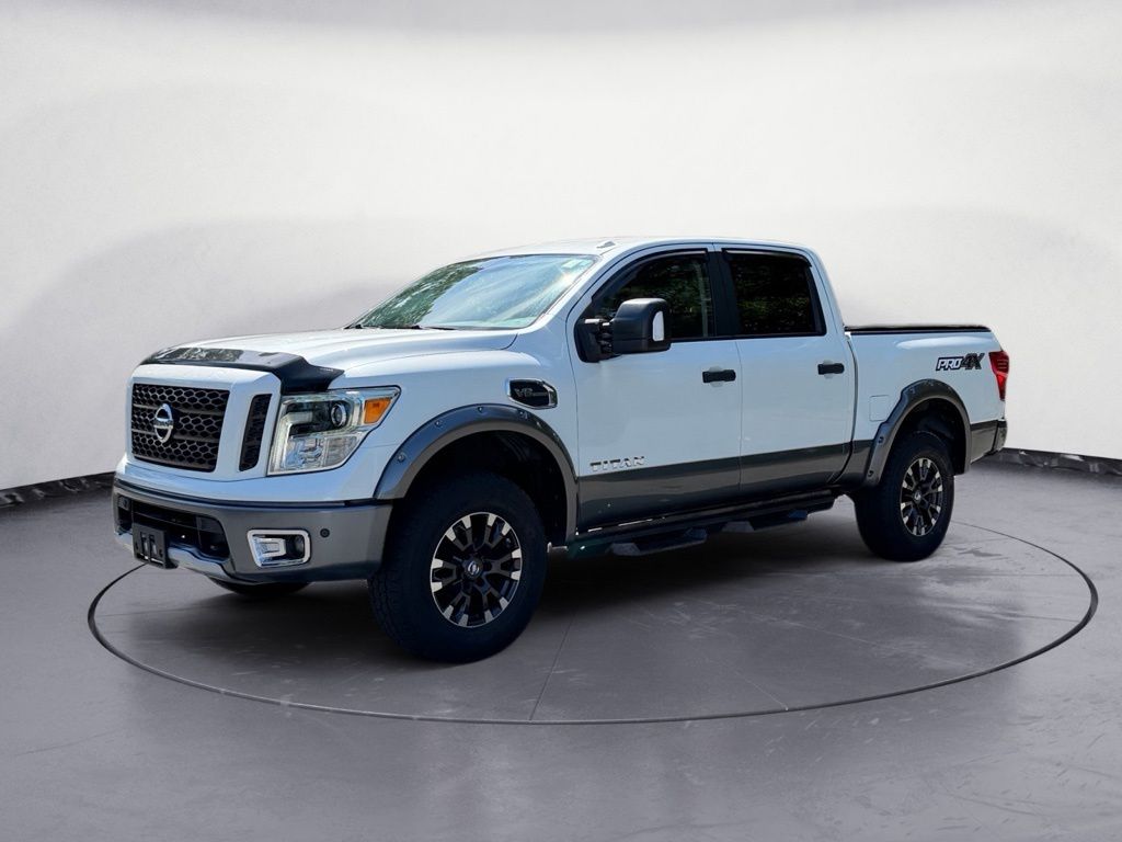 Pearl White 2017 Nissan Titan Pickup Truck Four-Wheel Drive 7-Speed Automatic