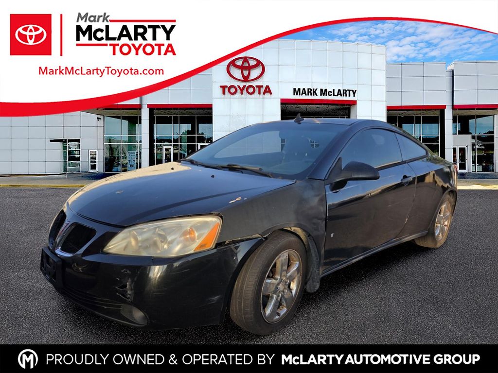 Carbon Black Metallic 2009 Pontiac G6 Sedan Front-Wheel Drive 4-Speed Automatic Overdrive