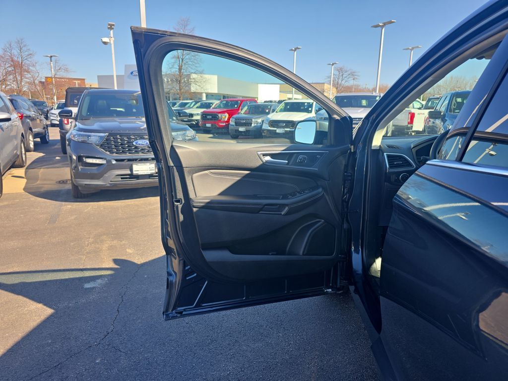 Certified Used 2024 Blue Ford Titanium image 14