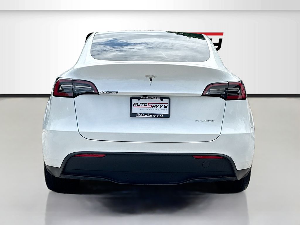 2024 Tesla Model Y Long Range White at AutoSavvy Houston Southwest