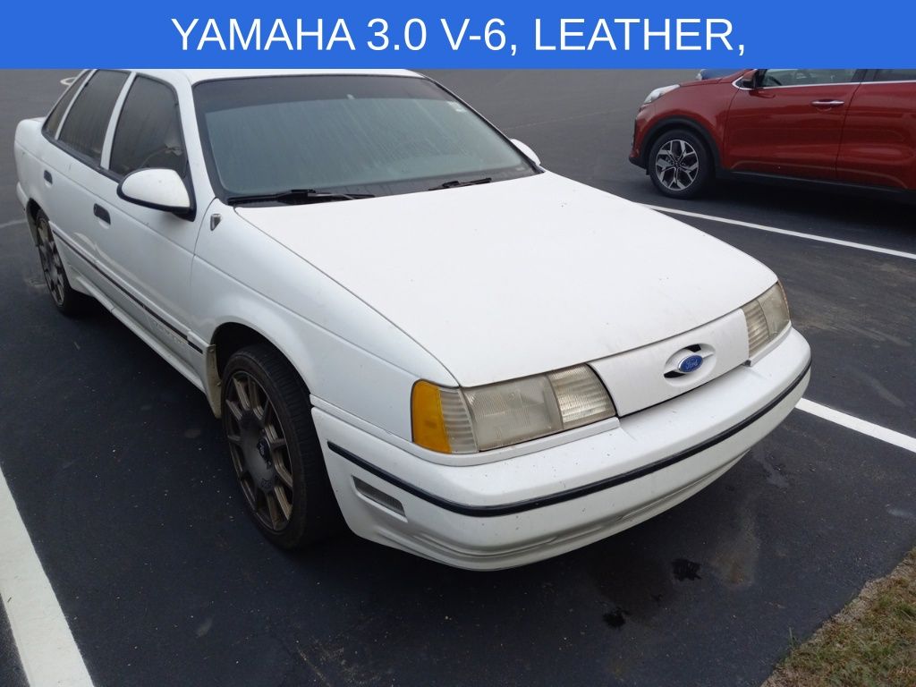 White 1989 Ford Taurus Sedan Front-Wheel Drive 5-Speed Manual