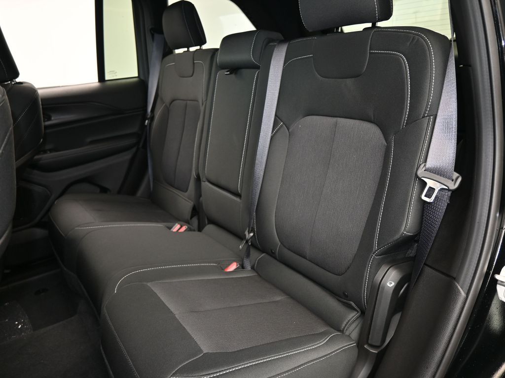 Used 2025 Diamond Black Crystal Pearlcoat Jeep Laredo image 29