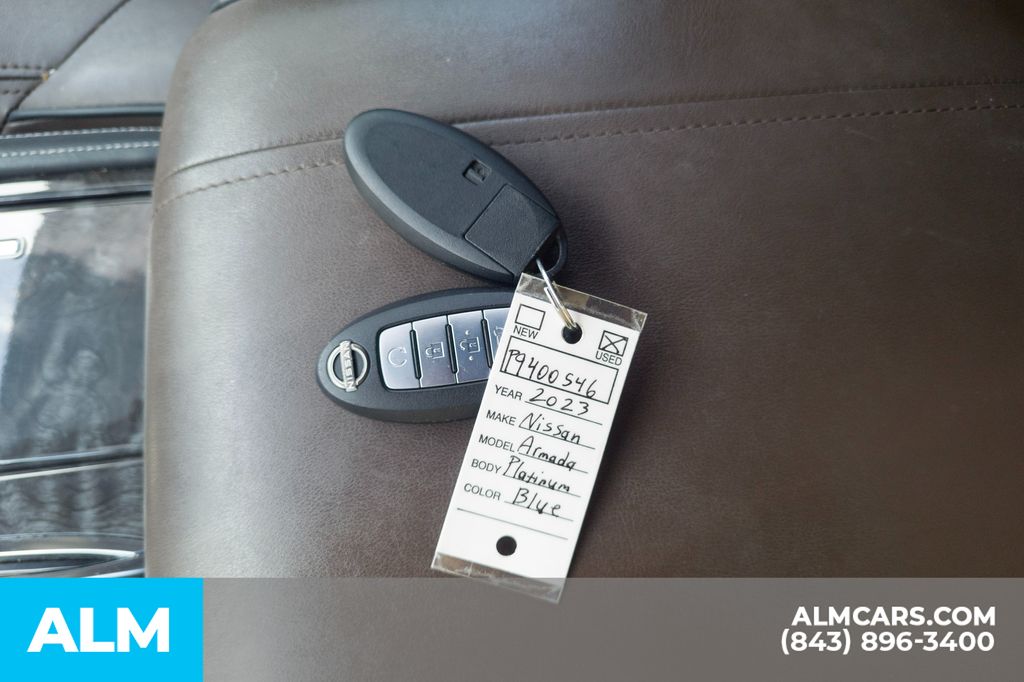 Used 2023 Blue Pearl Nissan Platinum image 17