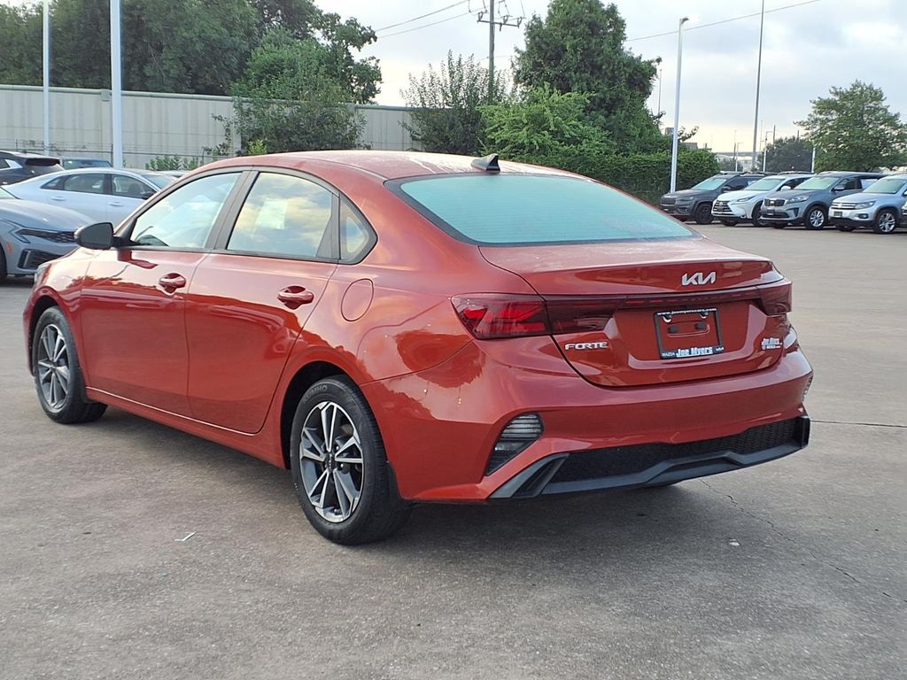 2023 Kia Forte LXS Red at Shottenkirk Kia Fort Bend