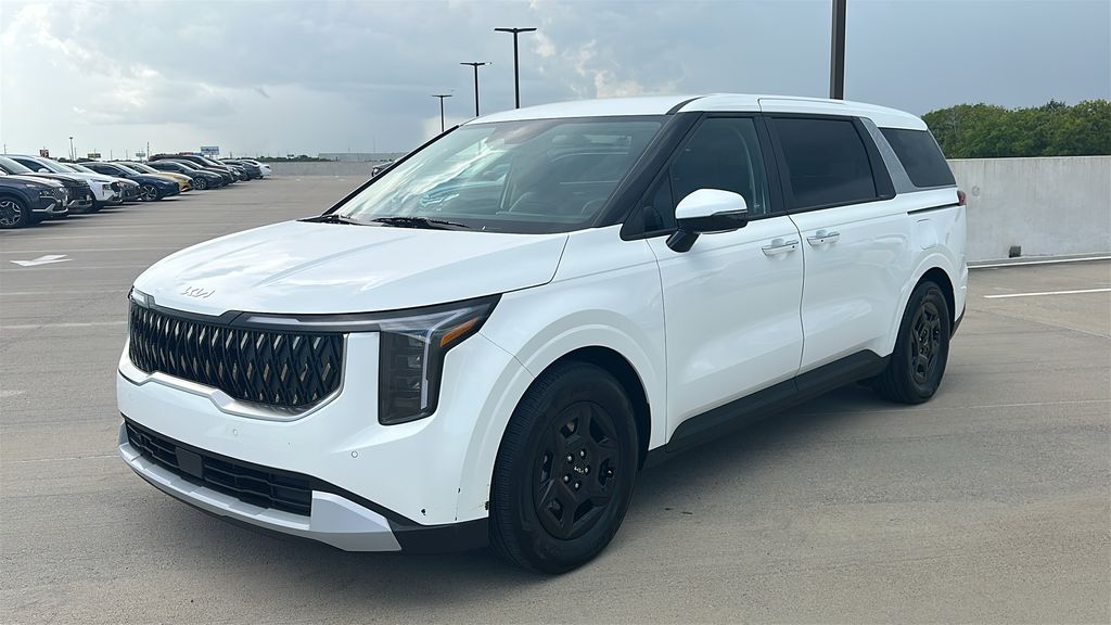 2026 Kia Carnival LXS White at DeMontrond Automotive Group