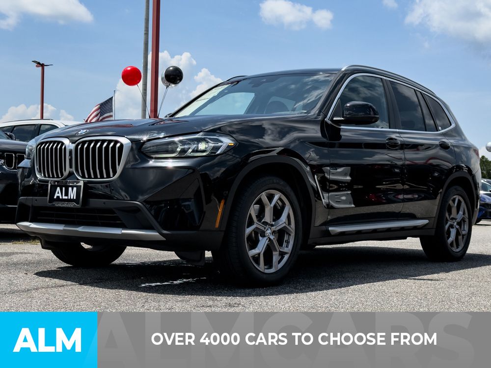 Used 2024 Black BMW sDrive30i image 2