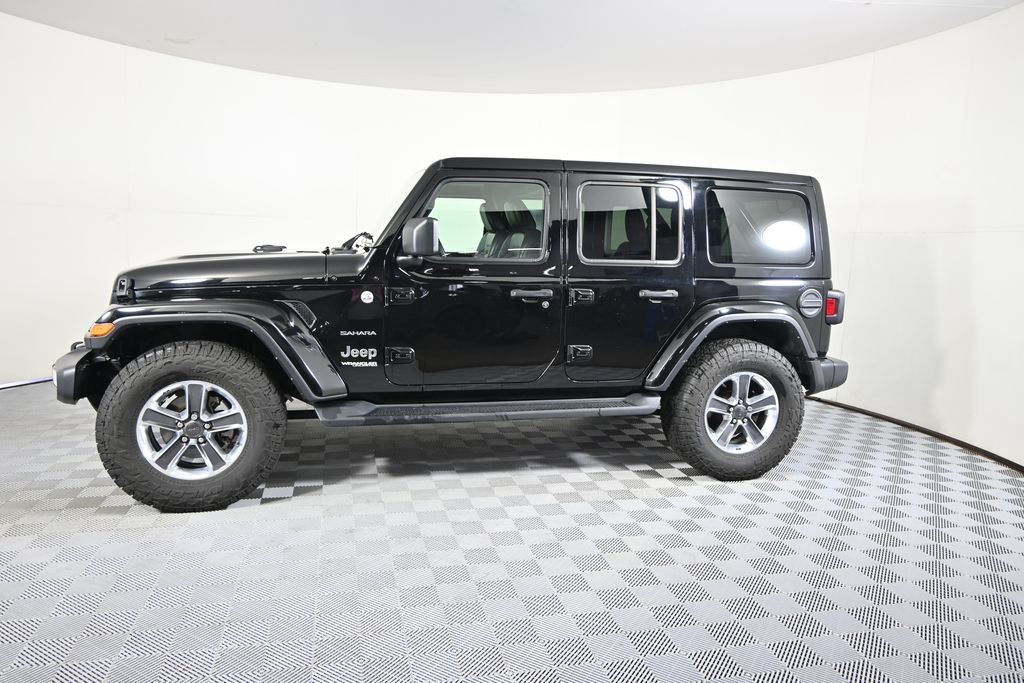Used 2022 Jeep Wrangler Unlimited Sahara with VIN 1C4HJXENXNW110068 for sale in Forest Lake, Minnesota