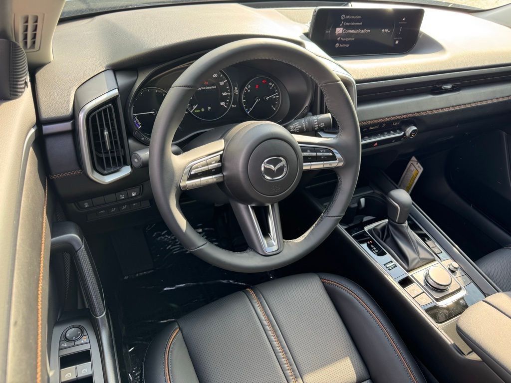 2025 Mazda CX-50 Hybrid Premium Gray at Stokes Mazda