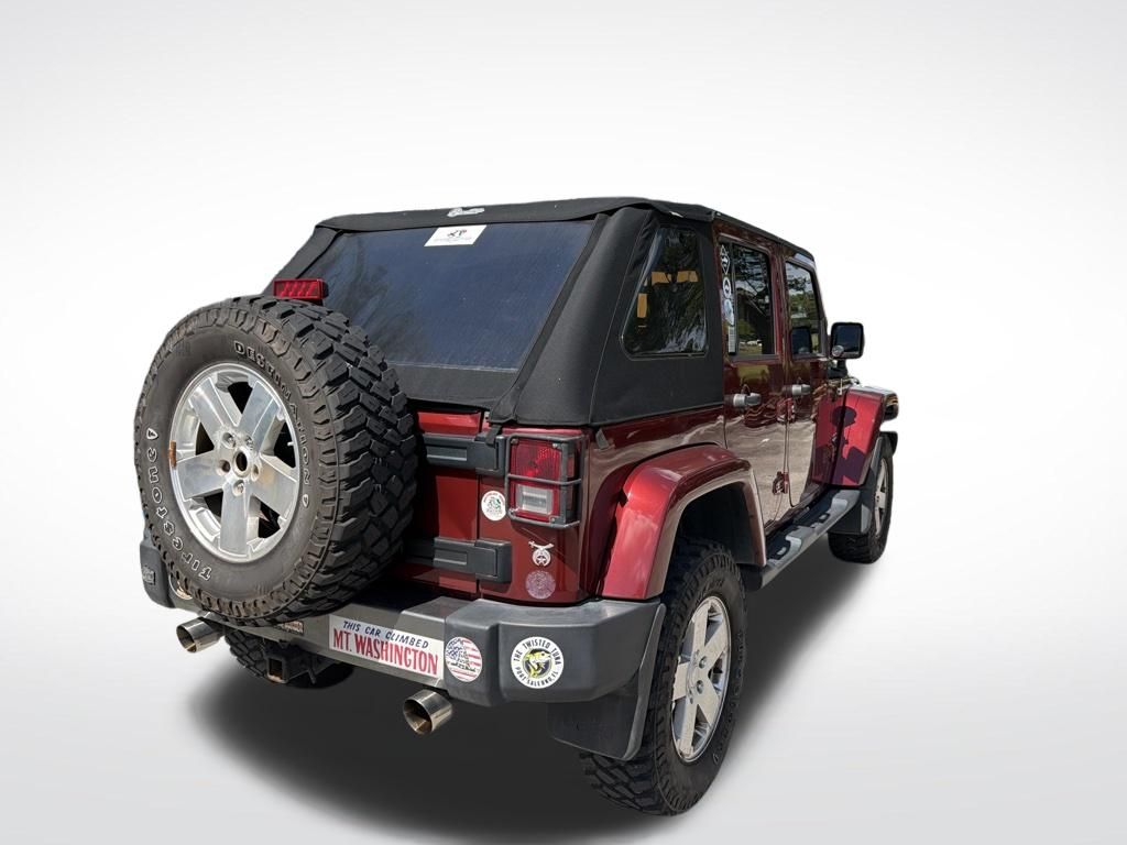 Used 2008 Red Jeep Unlimited Sahara image 5