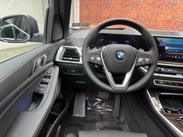 Used 2025 Black BMW xDrive50e image 13