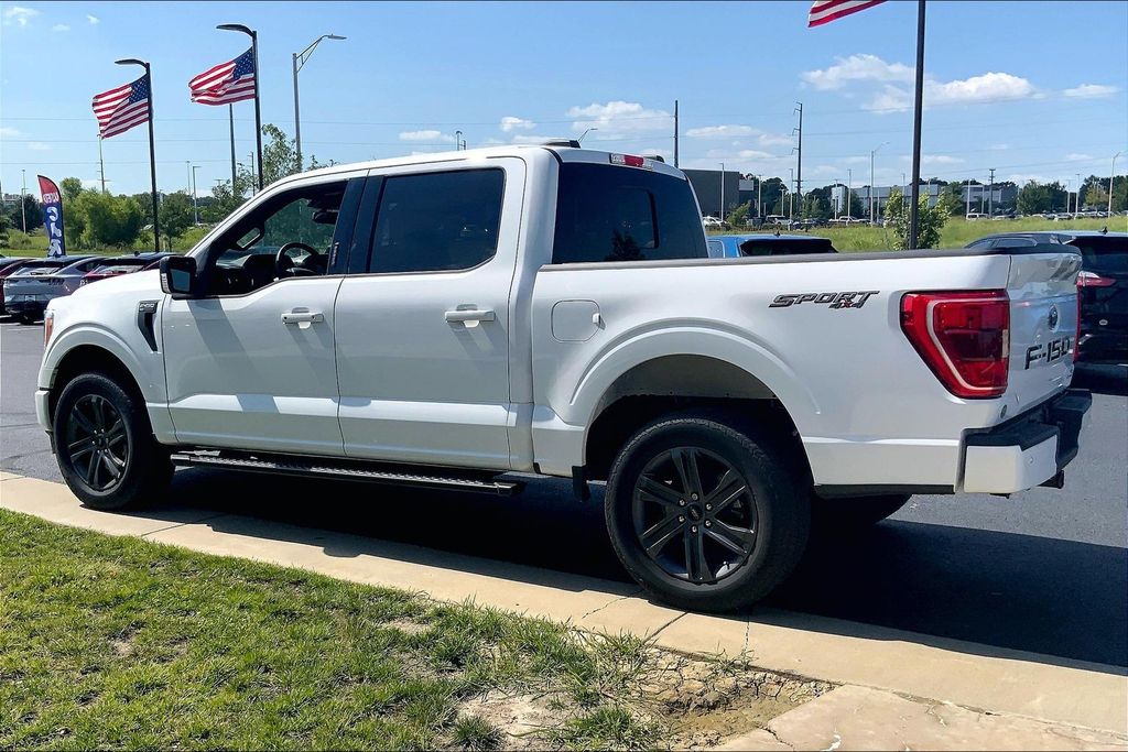 Used 2023 Ford F-150 XLT with VIN 1FTFW1E80PKD72028 for sale in Kansas City