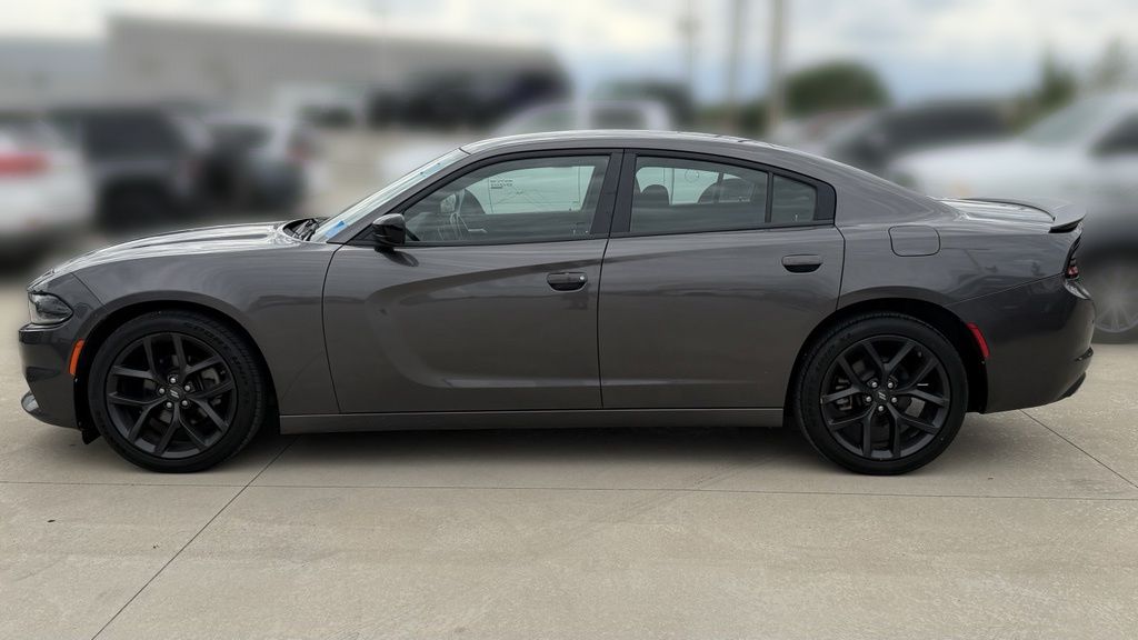 Used 2022 Dodge Charger SXT with VIN 2C3CDXBG9NH126224 for sale in Kansas City