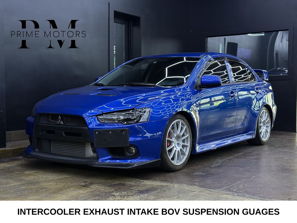 Blue / Black 2012 Mitsubishi Lancer Evolution Sedan All-Wheel Drive 5-Speed Manual
