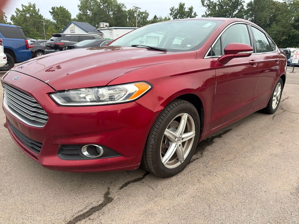 Ruby Red Metallic Tinted Clearcoat 2014 Ford Fusion Sedan Front-Wheel Drive 6-Speed Automatic