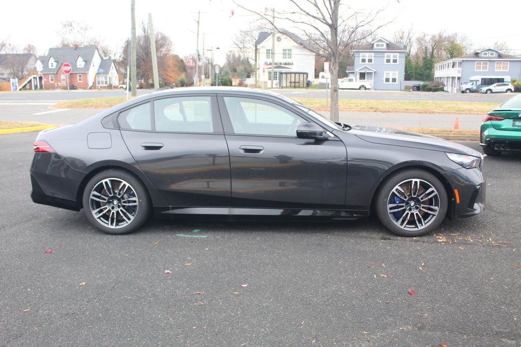 2026 BMW 5 Series 550e - Photo 11