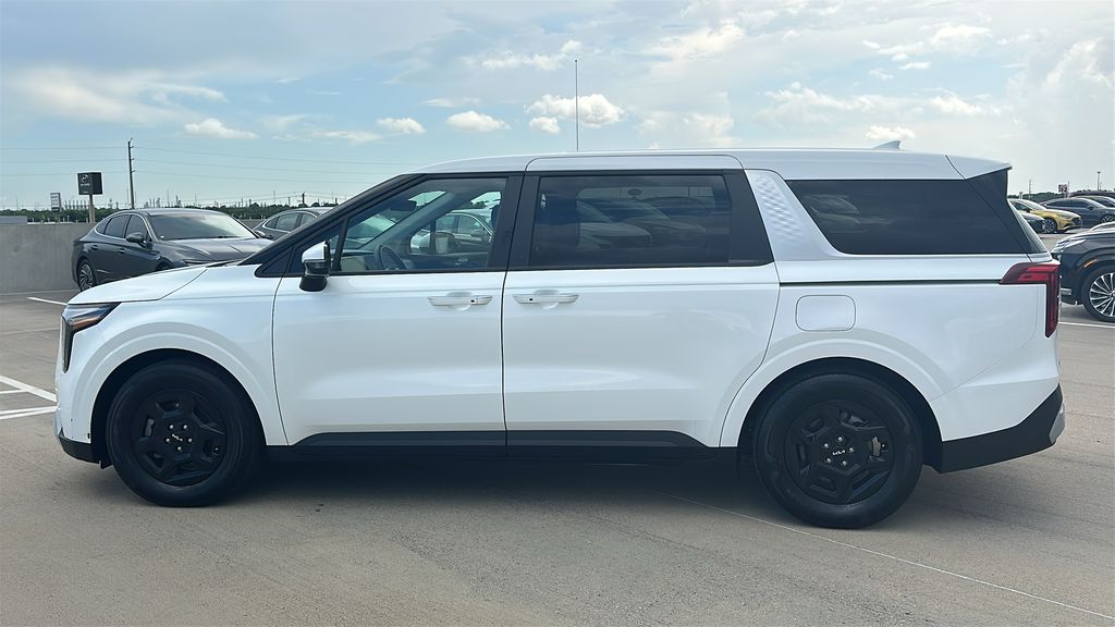 2026 Kia Carnival LXS White at DeMontrond Automotive Group