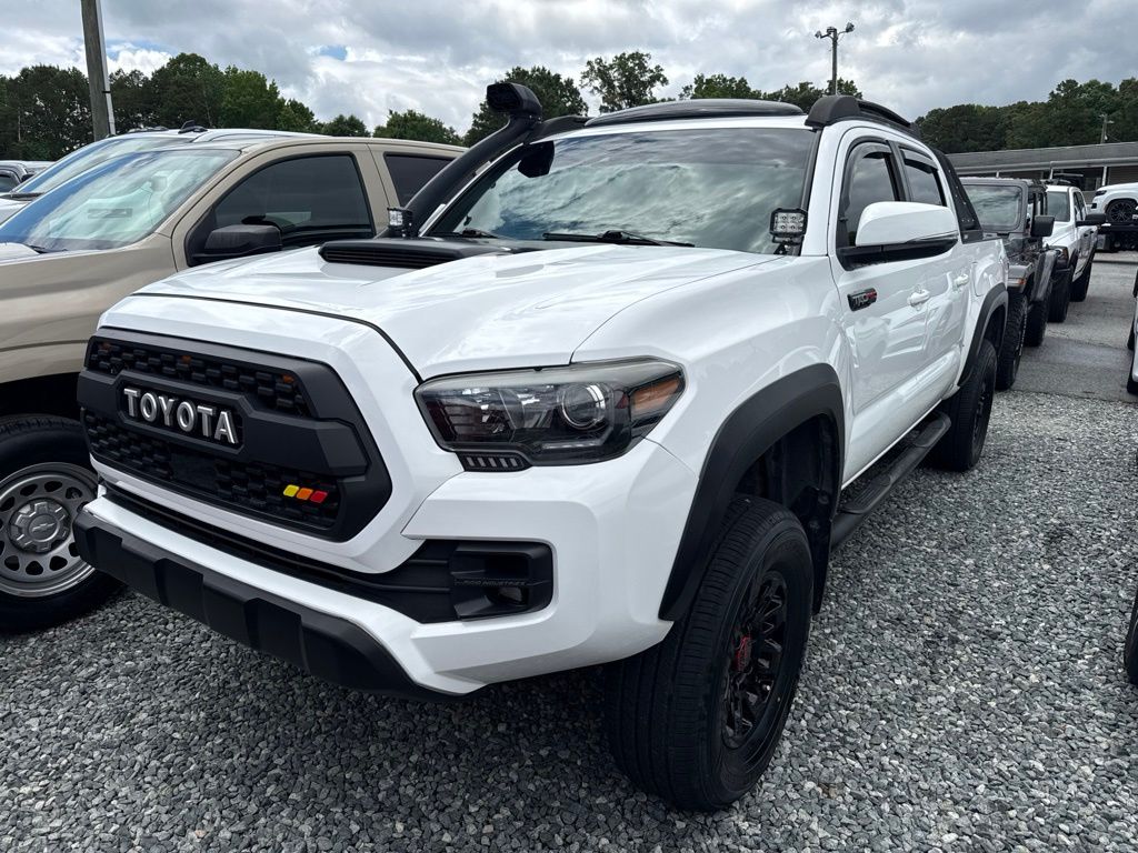 Super White 2019 Toyota Tacoma Pickup Truck Four-Wheel Drive 6-Speed Manual