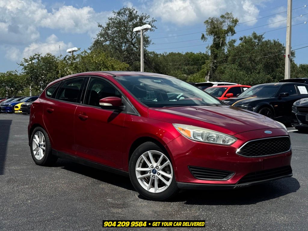 Ruby Red Metallic 2015 Ford Focus Hatchback Front-Wheel Drive 6-Speed Automatic