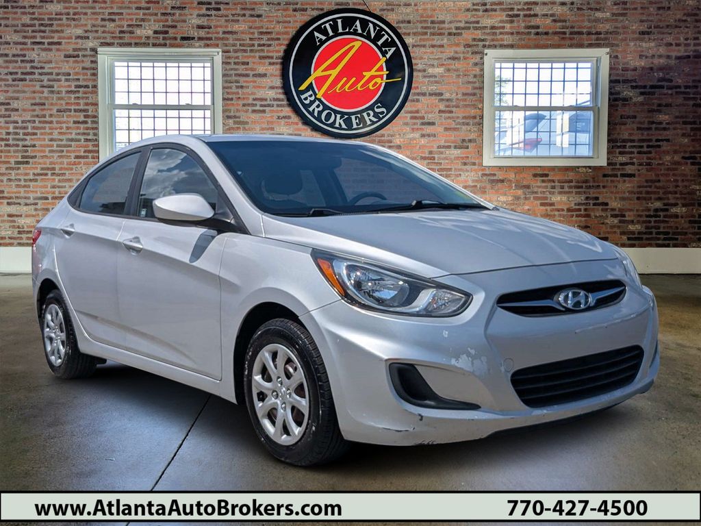 Ironman Silver Metallic 2013 Hyundai Accent Sedan Front-Wheel Drive 6-Speed Automatic Overdrive