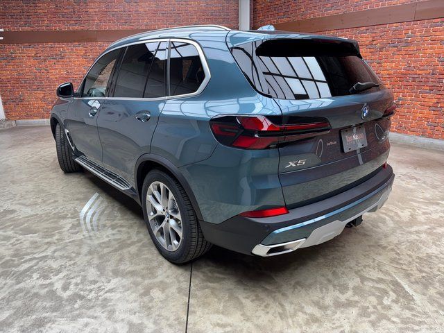 New 2026 Blue BMW xDrive50e image 3