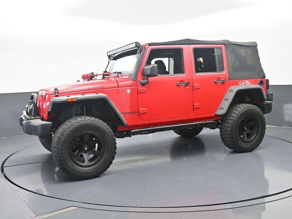 Used 2014 Firecracker Red Clear Coat Jeep Unlimited Rubicon image 2