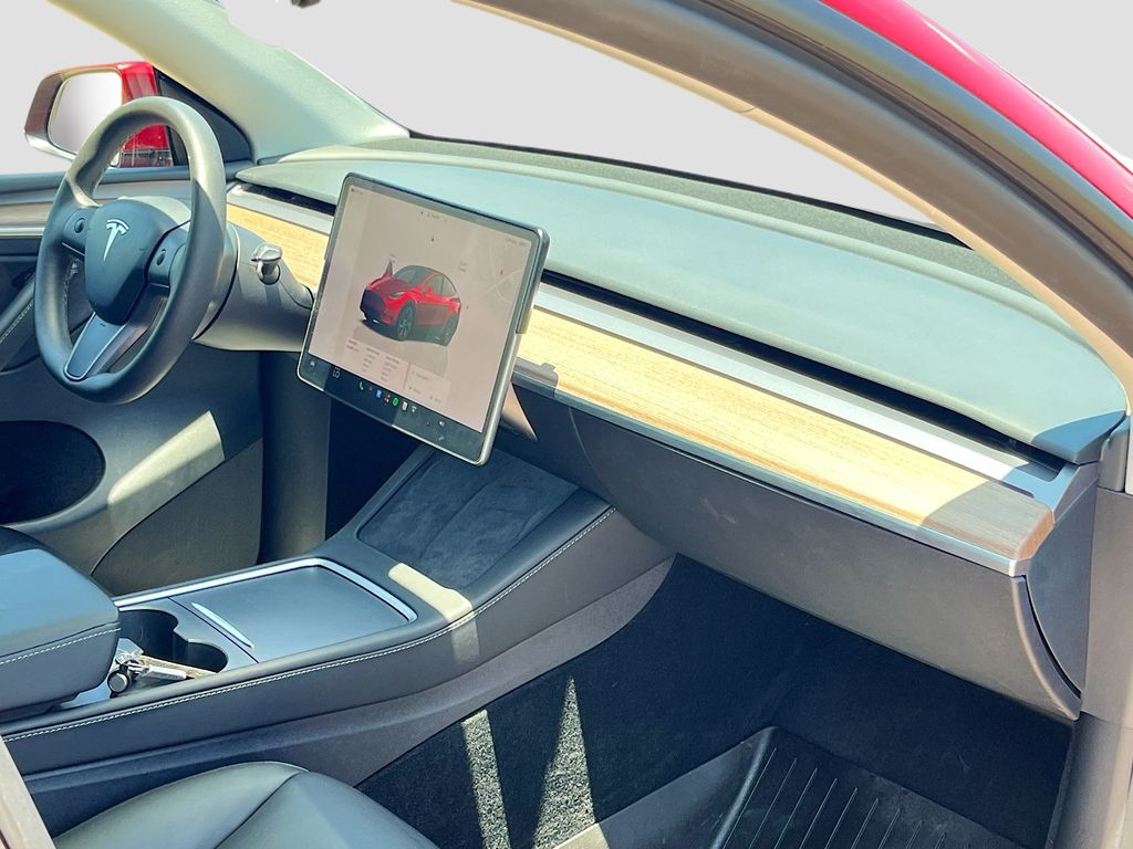 2024 Tesla Model Y Long Range Red at Ultimate Motorsports