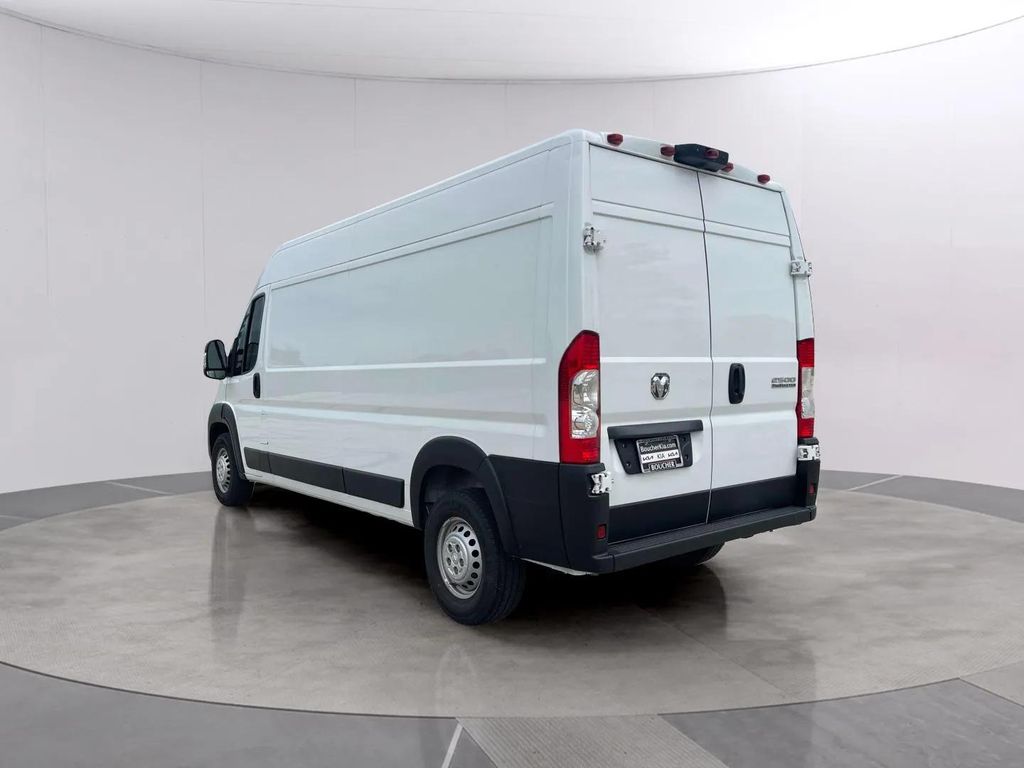 Used 2025 Bright White Clearcoat Ram High Roof image 3