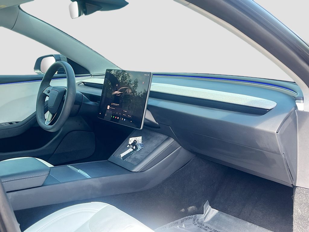 2025 Tesla Model 3 Long Range Black at AutoSavvy Houston Northwest