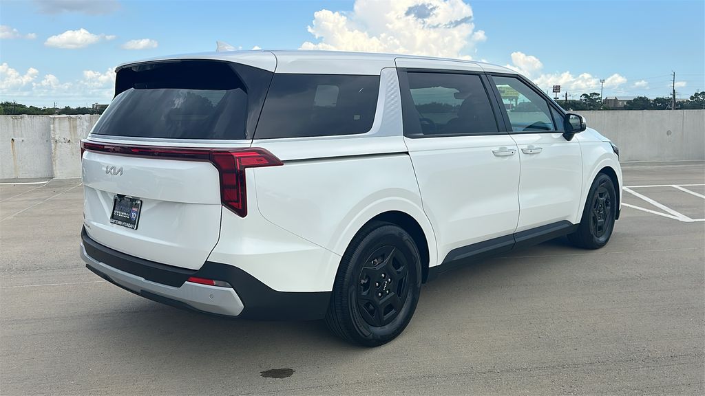 2026 Kia Carnival LXS White at DeMontrond Automotive Group