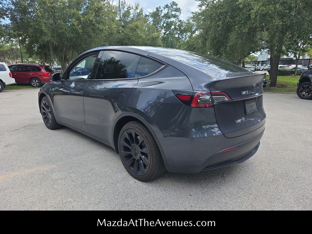 Used 2021 Tesla Model Y Long Range with VIN 5YJYGDEE5MF184143 for sale in Tampa, FL