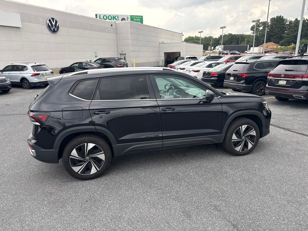 2025 Volkswagen Taos 1.5T SE Black at Sutliff Volkswagen