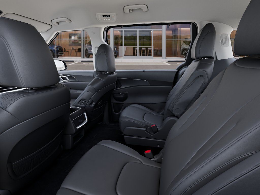 2027 Blue Kia Carnival EX FWD Van
