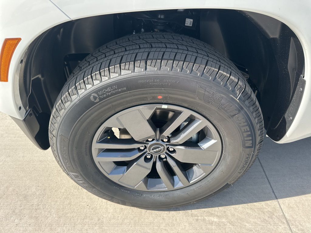 2025 Glacier White Nissan Frontier SV RWD Truck