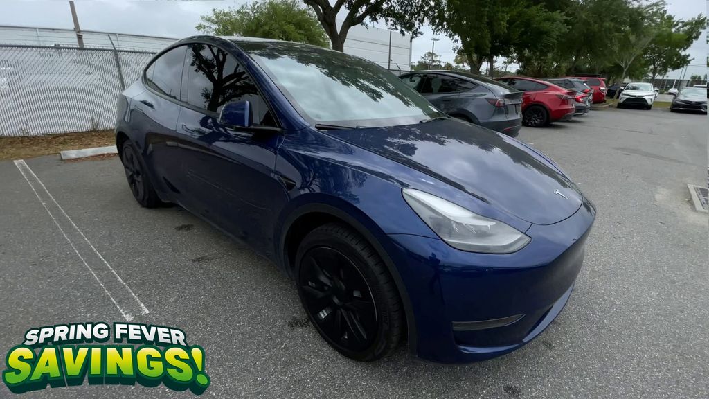 Used 2024 Tesla Model Y Long Range with VIN 7SAYGDED1RF044401 for sale in Jacksonville, FL