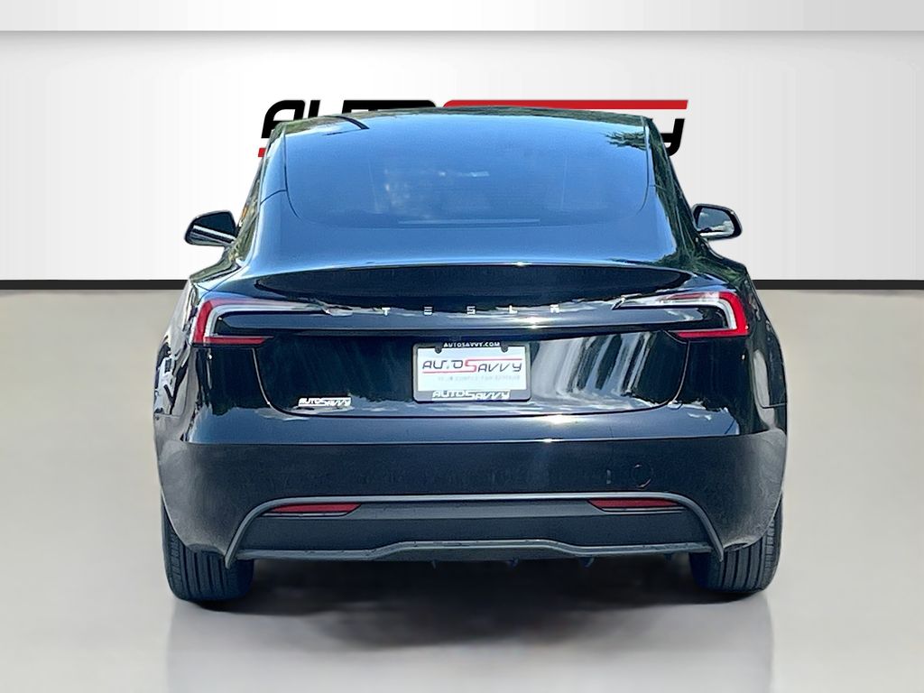 2025 Tesla Model 3 Long Range Black at AutoSavvy Houston Northwest