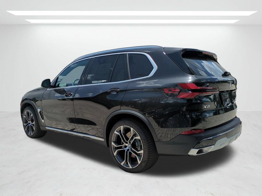 New 2026 Black BMW xDrive50e image 6