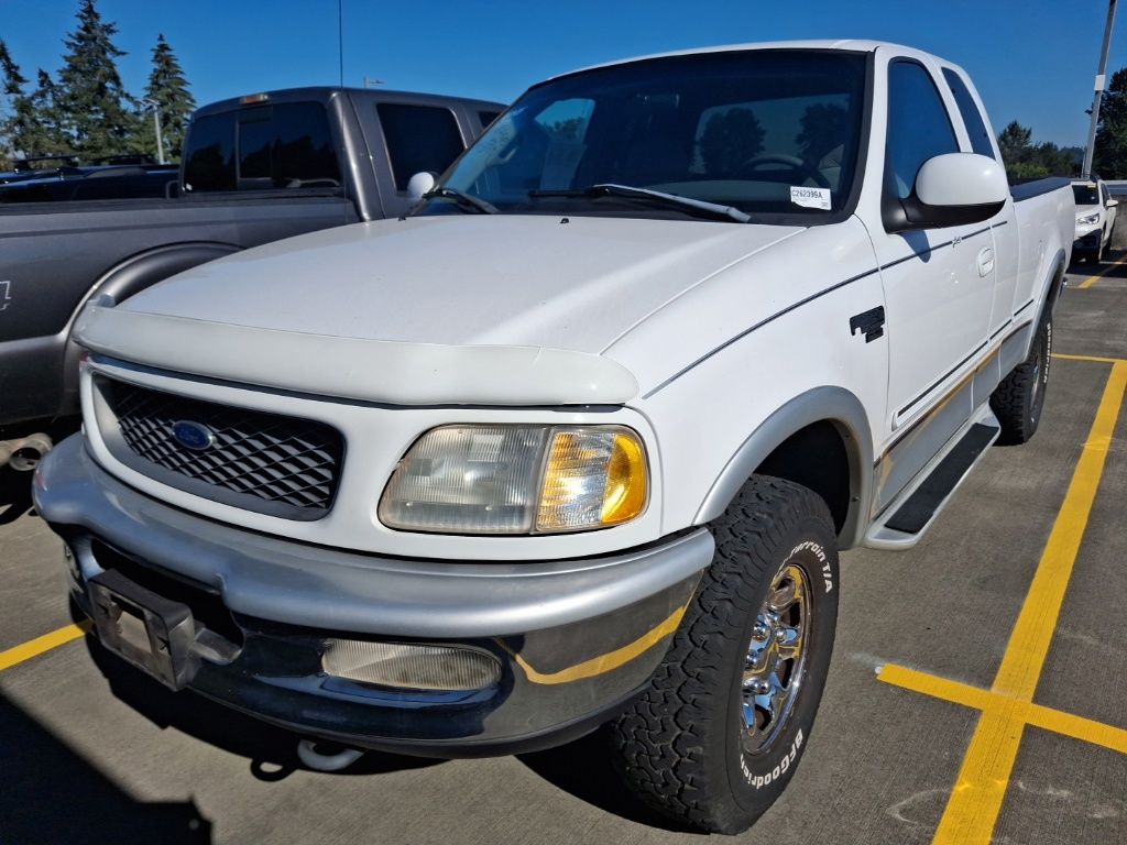 White 1998 Ford F-250 Pickup Truck Four-Wheel Drive 4-Speed Automatic Overdrive