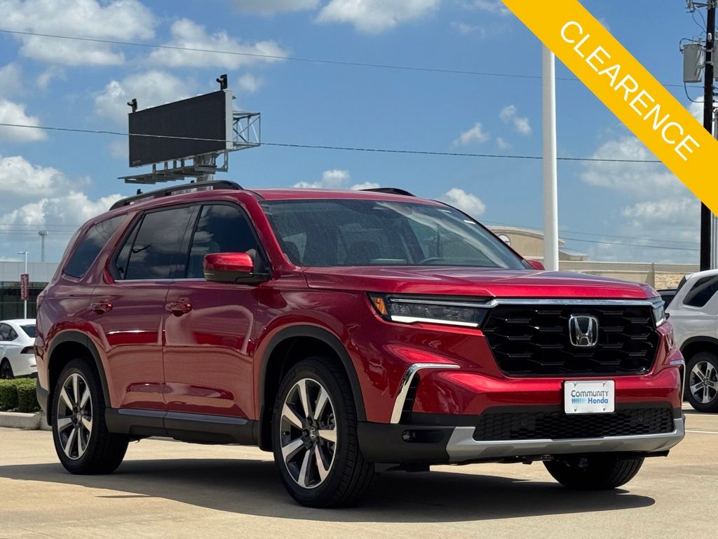 2025 Honda Pilot Touring Red at AutoSavvy Houston Northwest