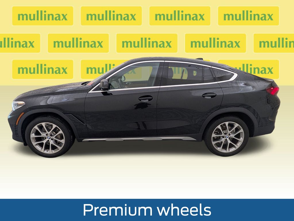 Certified Used 2023 Black BMW xDrive40i image 11