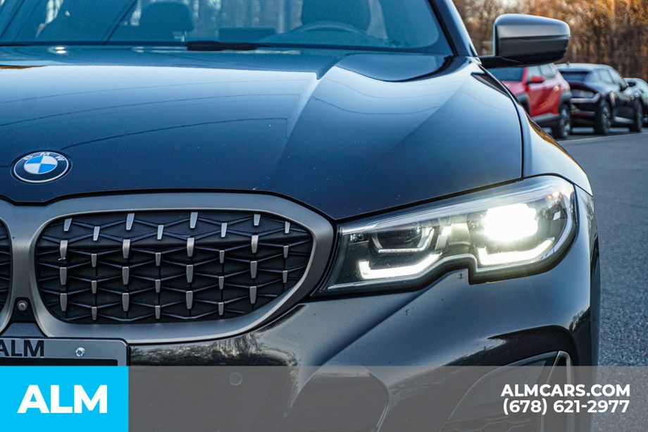 Used 2022 Black BMW M340i xDrive image 12