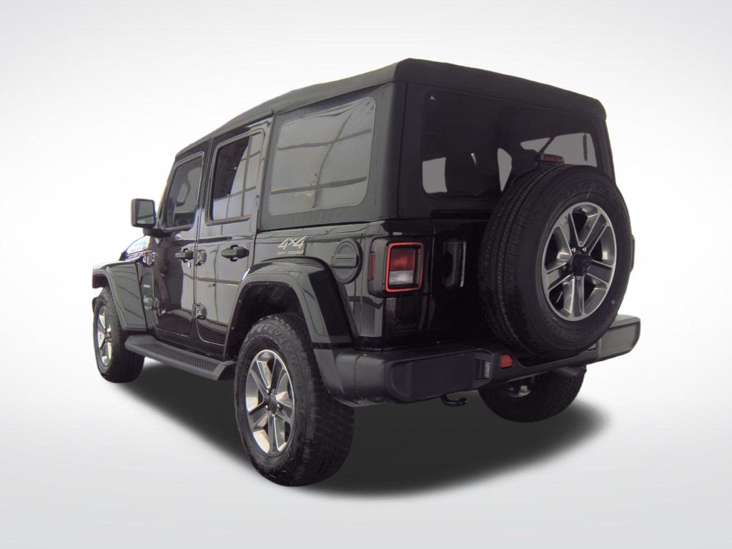 Used 2022 Black Jeep Unlimited Sahara image 2