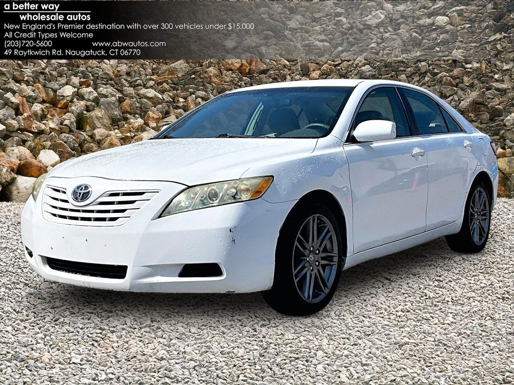 White 2009 Toyota Camry Sedan 5-Speed Manual Overdrive